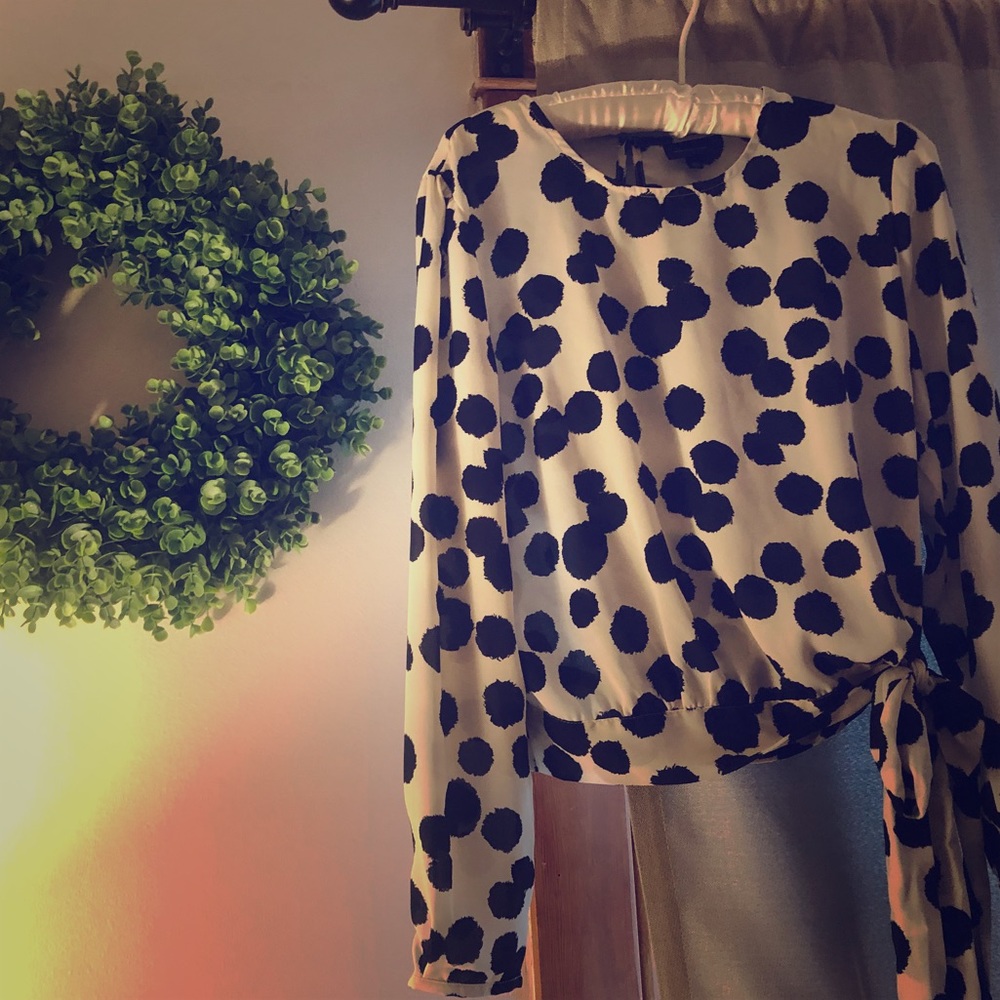 Black and white side tie waist blouse